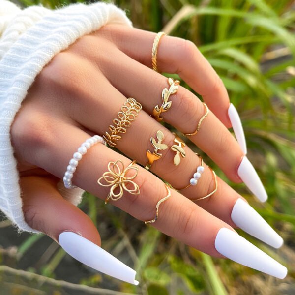 Bague avec motif floral ajouré, style simple et brillant